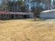 House with a red roof and a detached garage, large yard at 744 N Little Egypt Rd, Denver, NC 28037