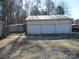 Three-car garage with additional storage shed in the backyard at 744 N Little Egypt Rd, Denver, NC 28037