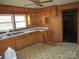 Kitchen with wood cabinets and vinyl flooring at 744 N Little Egypt Rd, Denver, NC 28037