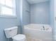 Bathroom with a bathtub, toilet and neutral colored walls at 842 Wilcrest Ct, York, SC 29745