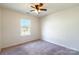 Bright bedroom with window, ceiling fan and neutral walls at 842 Wilcrest Ct, York, SC 29745