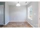 Simple dining area with tile flooring and a window providing natural light at 842 Wilcrest Ct, York, SC 29745