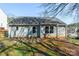 Rear view of house with patio and landscaping at 842 Wilcrest Ct, York, SC 29745