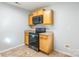 Kitchen with wood cabinets and black appliances at 842 Wilcrest Ct, York, SC 29745