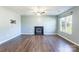 Living room with hardwood floors, fireplace, and window at 842 Wilcrest Ct, York, SC 29745