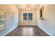 Spacious dining area featuring hardwood floors and a window at 8941 Bradstreet Commons Way, Charlotte, NC 28215