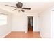 Spacious bedroom with hardwood floors and ceiling fan at 9 N 11Th Ave, Maiden, NC 28650