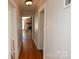 Bright hallway with hardwood floors leading to living areas at 9 N 11Th Ave, Maiden, NC 28650