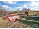 Aerial view of red barns and other farm buildings at 956 Stony Point Rd, Kings Mountain, NC 28086