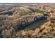 Aerial view of a property with a pond and woodland at 956 Stony Point Rd, Kings Mountain, NC 28086