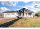 White house with a two-car garage and a front porch at 956 Stony Point Rd, Kings Mountain, NC 28086
