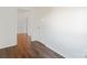 Light-filled hallway with wood floors leading to other rooms at 956 Stony Point Rd, Kings Mountain, NC 28086