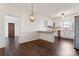 Kitchen features white cabinets, stainless steel appliances, and breakfast bar at 956 Stony Point Rd, Kings Mountain, NC 28086