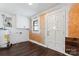 Laundry room with water heater and built-in cabinets at 956 Stony Point Rd, Kings Mountain, NC 28086