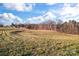 Open field with distant trees and blue sky at 956 Stony Point Rd, Kings Mountain, NC 28086