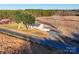 Aerial view showing a ranch house and a long driveway at 101 S Moose Rd, Mount Pleasant, NC 28124