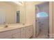 Bathroom boasts double vanity and a separate toilet area at 104 Fox Den Cir, Statesville, NC 28677