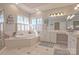 Spa-like bathroom with soaking tub and walk-in shower at 104 Fox Den Cir, Statesville, NC 28677