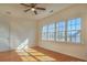 Spacious bedroom with hardwood floors and large windows at 104 Fox Den Cir, Statesville, NC 28677