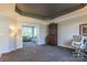 Spacious home office with a view into a sunroom at 104 Fox Den Cir, Statesville, NC 28677