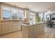 Spacious kitchen boasts an island, updated cabinets, and ample counter space at 104 Fox Den Cir, Statesville, NC 28677