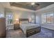 Spacious main bedroom with a king-size bed and two windows at 104 Fox Den Cir, Statesville, NC 28677