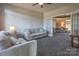 Sunroom with sofas and French doors leading to home office at 104 Fox Den Cir, Statesville, NC 28677