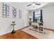 Home office with hardwood floors and built-in workspace at 1122 Penrose Ln, Charlotte, NC 28217