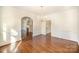 Elegant dining room with hardwood floors, chandelier and built-ins at 1200 W Franklin St, Monroe, NC 28112