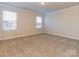 Bright bedroom with neutral walls and carpeted floor at 1334 31St St # 6, Conover, NC 28613