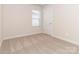 Bright bedroom with neutral walls and carpet at 1334 31St St # 6, Conover, NC 28613