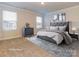 Virtually staged bedroom with carpeted floor and large windows at 1334 31St St # 6, Conover, NC 28613