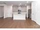 Bright kitchen boasts an island, stainless steel appliances, and gray cabinets at 1334 31St St # 6, Conover, NC 28613
