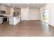 Open concept kitchen with island, gray cabinets, and stainless steel appliances at 1334 31St St # 6, Conover, NC 28613