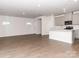 Open concept kitchen with island, stainless steel appliances, and gray cabinets at 1334 31St St # 6, Conover, NC 28613