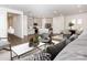 Virtually staged living room, kitchen, and dining area with hardwood floors at 1334 31St St # 6, Conover, NC 28613