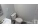 Small bathroom with white toilet and sink at 1408 Delview Rd, Cherryville, NC 28021