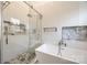 Luxurious bathroom with soaking tub and large walk-in shower at 2702 Oxborough Dr, Matthews, NC 28105