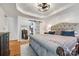 Main bedroom with a large bed, walk-in closet, and barn door at 2702 Oxborough Dr, Matthews, NC 28105