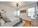 Cozy bedroom with hardwood floors and a comfortable bed at 2702 Oxborough Dr, Matthews, NC 28105