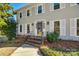 Brick steps leading to a front door with a glass insert and sidelights at 2702 Oxborough Dr, Matthews, NC 28105