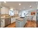 Eat-in kitchen, stainless steel appliances, granite counters, hardwood floors at 2702 Oxborough Dr, Matthews, NC 28105