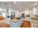 Bright kitchen with granite counters, stainless steel appliances, and a large island at 2702 Oxborough Dr, Matthews, NC 28105
