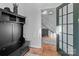 Hallway with bench, coat rack, and view of staircase at 304 Haney St, China Grove, NC 28023