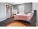 Charming bedroom with a pink comforter and a vanity at 448 Kennerly Center Dr, Mooresville, NC 28115