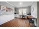 Bright home office with wood desk and window at 448 Kennerly Center Dr, Mooresville, NC 28115