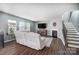 Living room with fireplace and hardwood floors at 448 Kennerly Center Dr, Mooresville, NC 28115