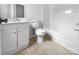 Bathroom featuring a single vanity with tub and toilet at 4818 Whistling Oak Ct, Charlotte, NC 28269