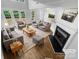 Bright living room with fireplace, hardwood floors, and neutral decor at 4818 Whistling Oak Ct, Charlotte, NC 28269