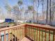 Spacious backyard with wooden deck, shed, and swing set at 5719 Clintwood Dr, Stanley, NC 28164